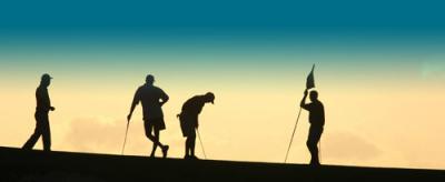 Silhouette of golfers